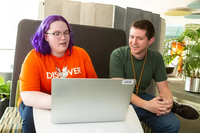 Image of two devs collaborating